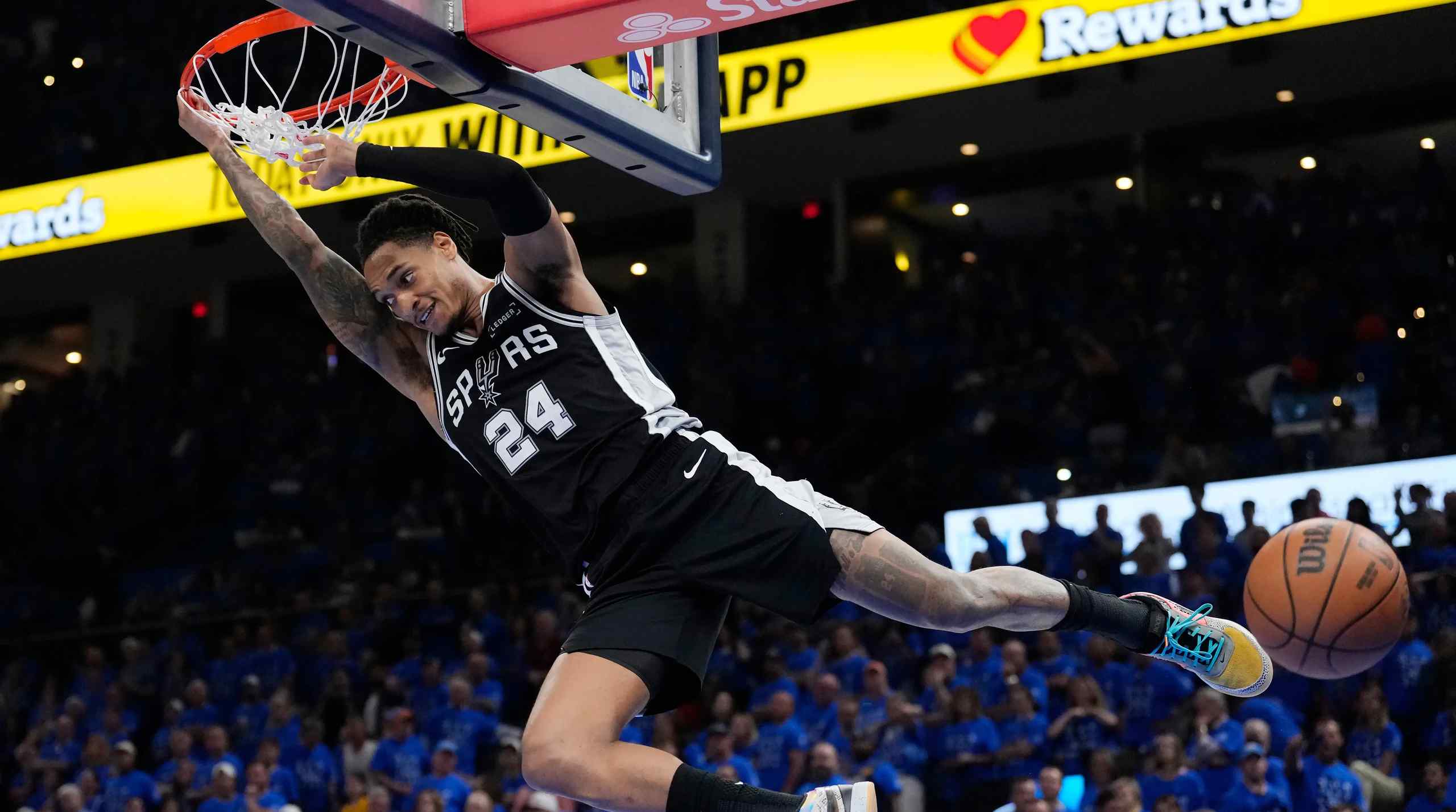 San Antonio Spurs guard Devin Vassell after dunking